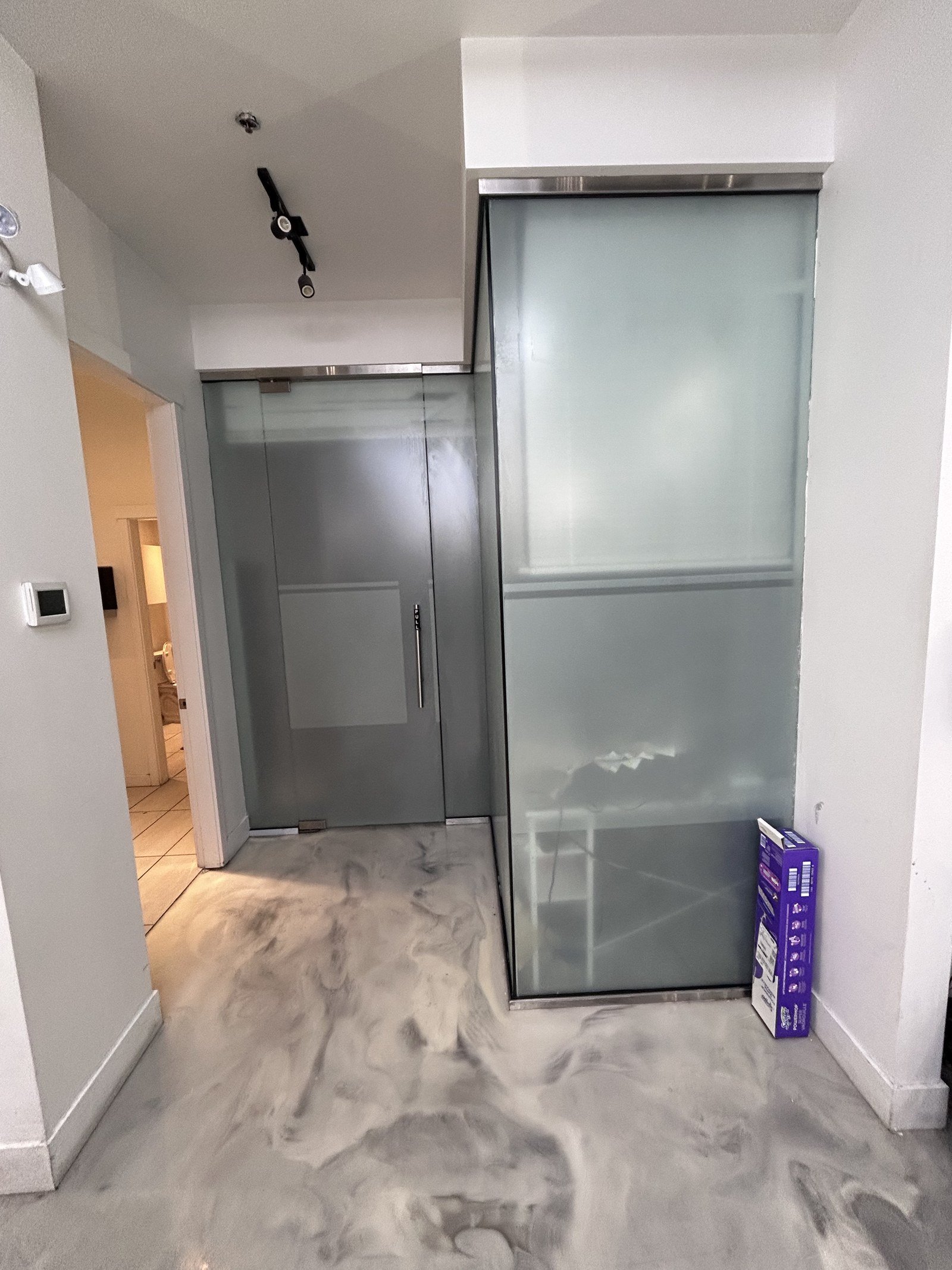 Frosted privacy film installed on interior office glass doors