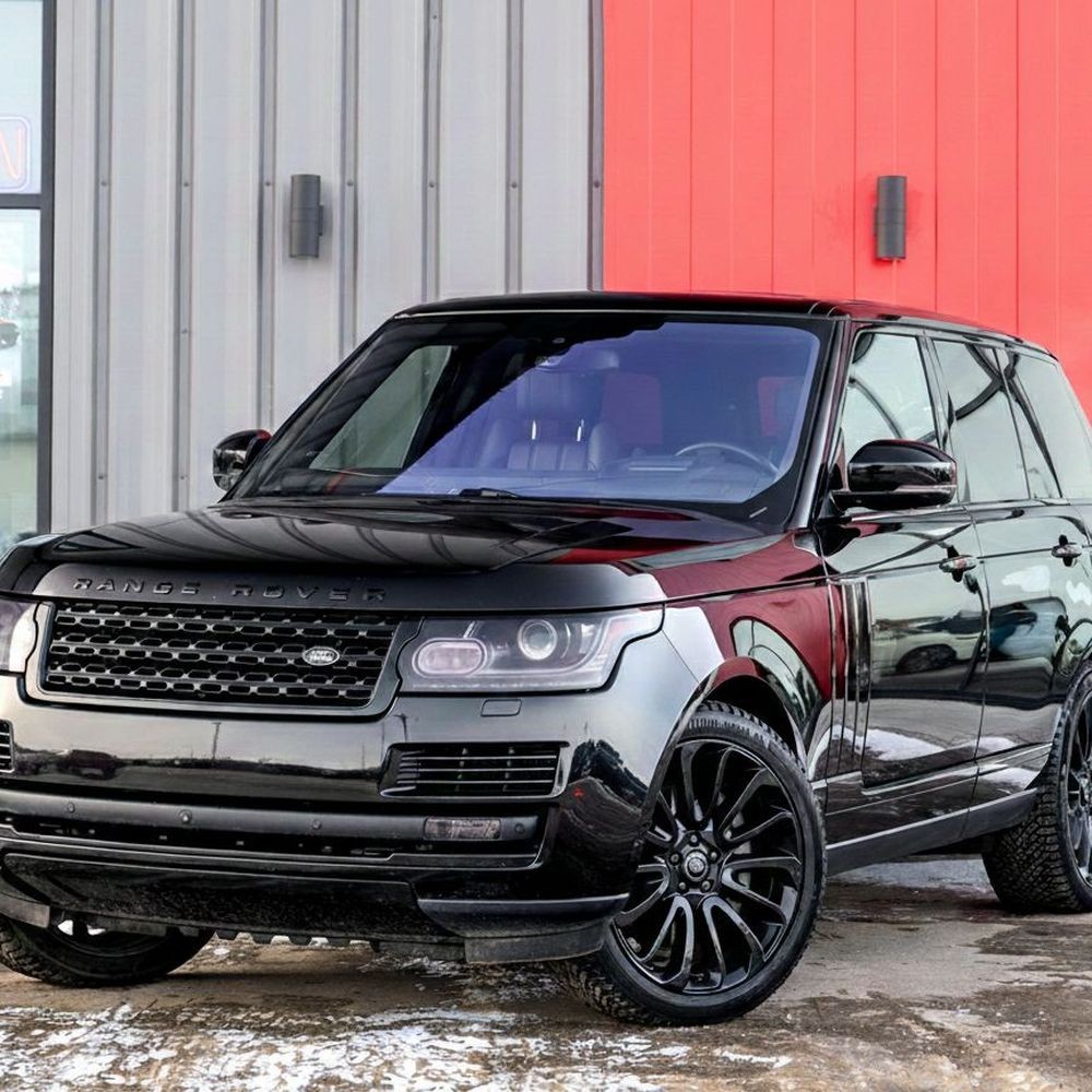 Blacked-out Range Rover with full tint package